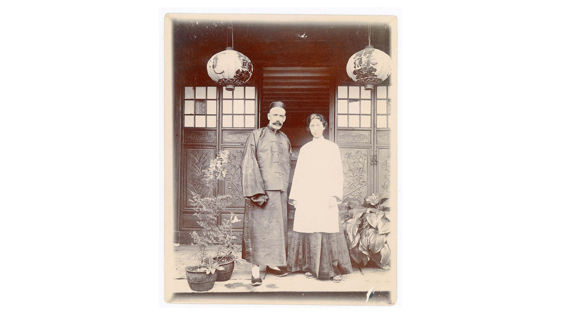 Dr. Clark and his wife Wynnie, in front of “Yesu tang” (Jesus Hall).