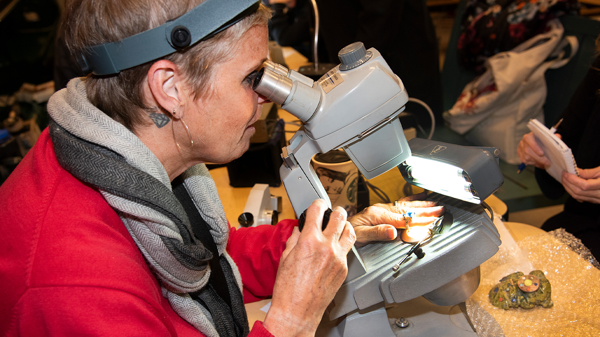Women looking through telescope