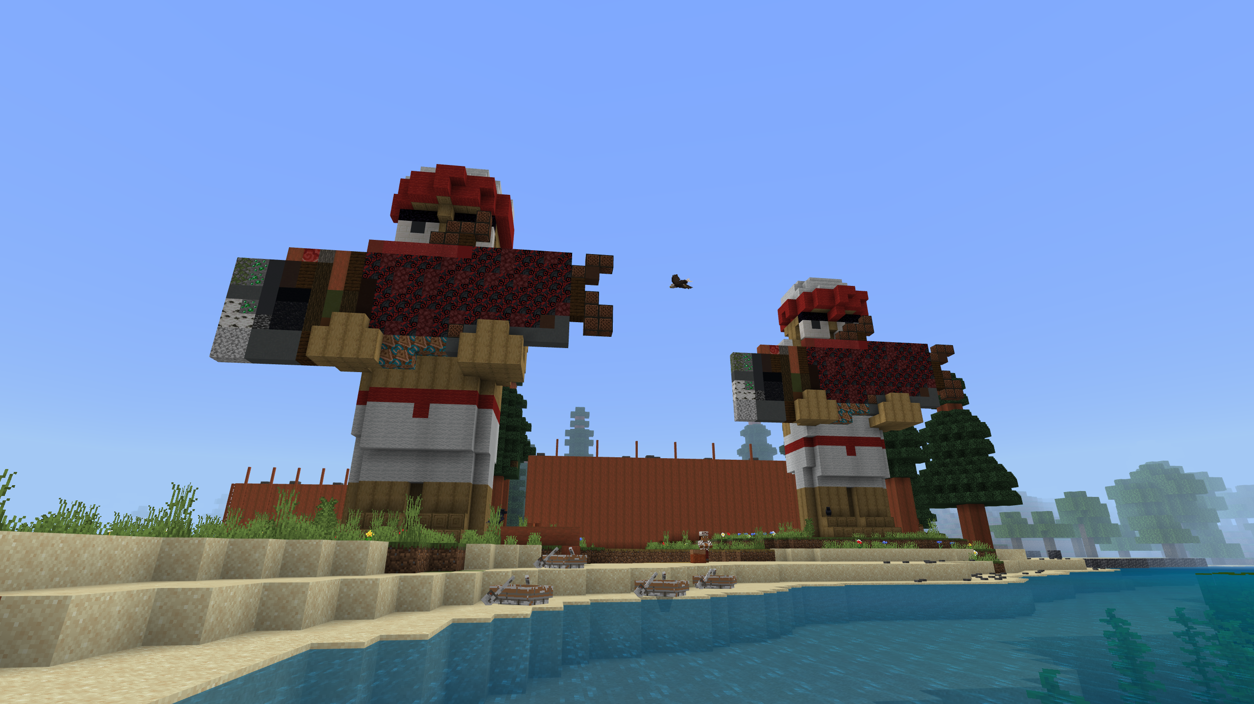 Capture d'écran Minecraft de deux grandes statues tenant des saumons sur une plage.