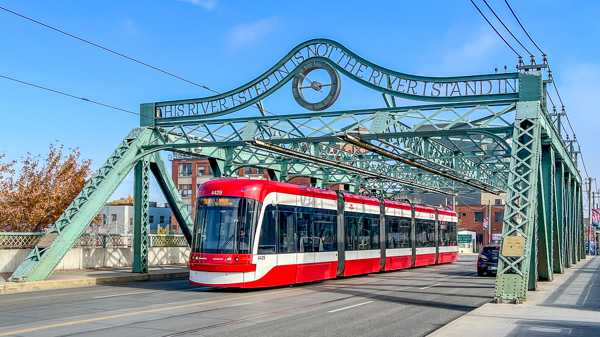Bridge with street car going under it