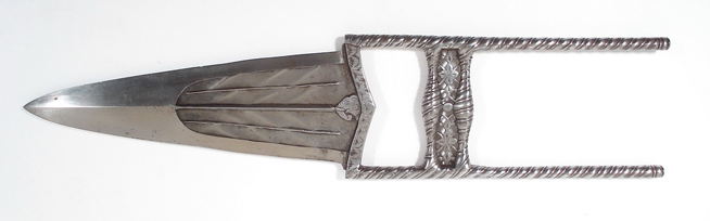 Intricately carved wooden double-headed paddle with a central handle grip.