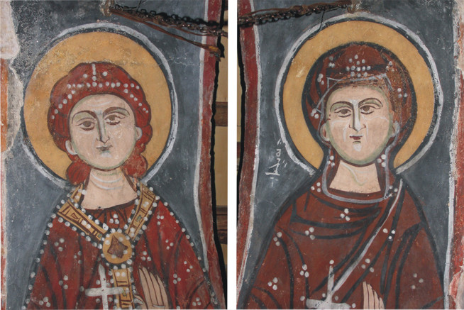 Two painted religious figures with halos, wearing red robes, on a dark background.
