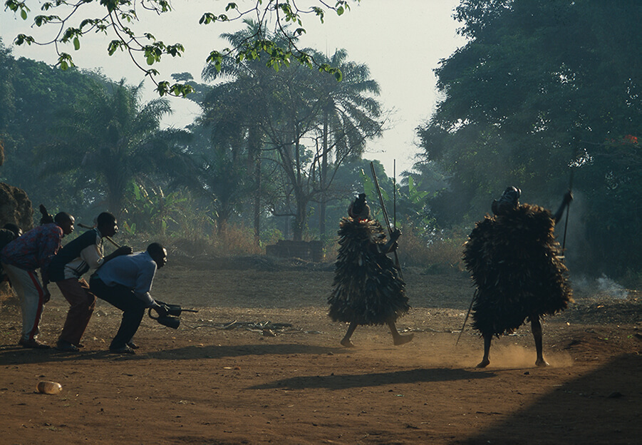 People dancing in a field.
