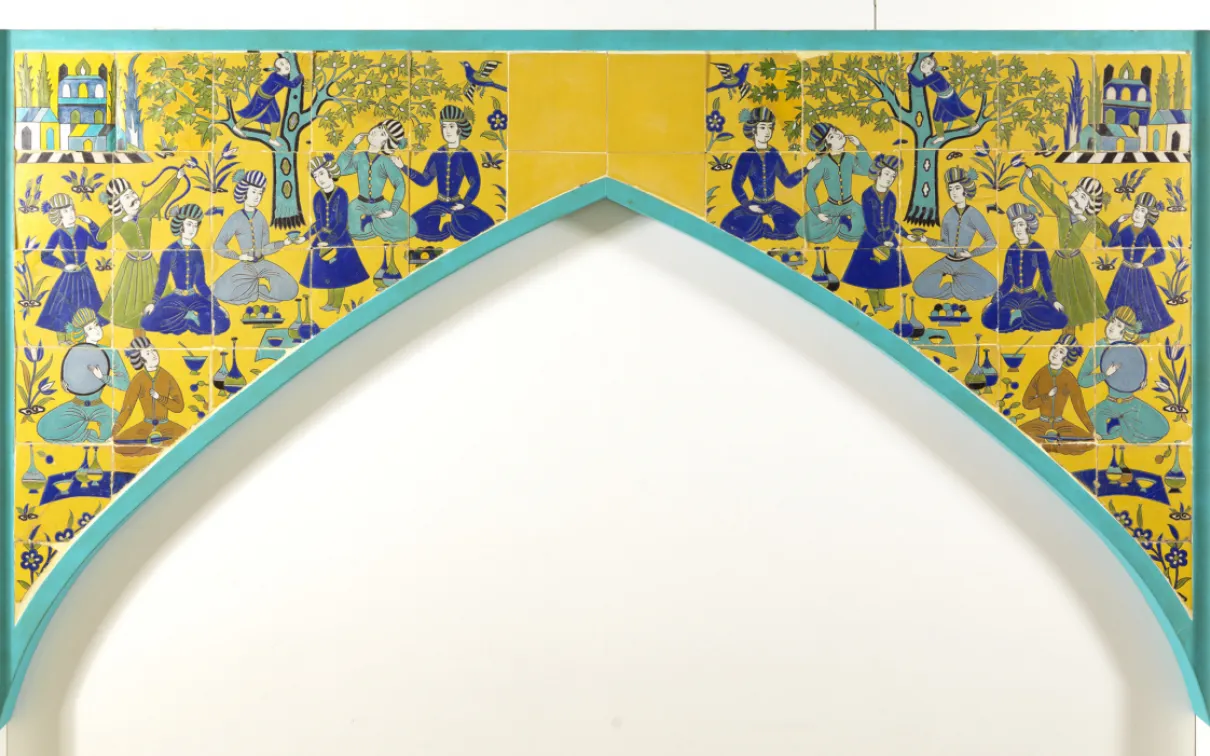 Decorative arch with yellow and blue tile artwork featuring geometric and floral patterns.