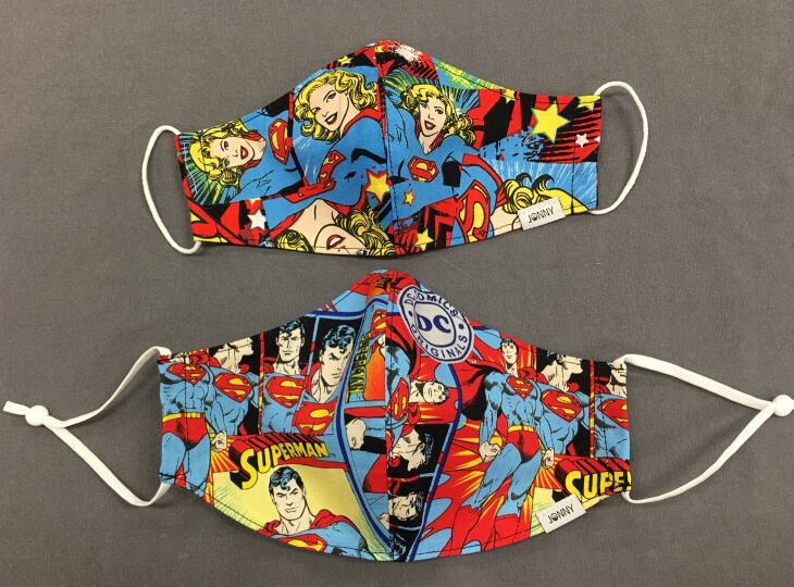 Supergirl and Superman masks by JonnyMask of Toronto.