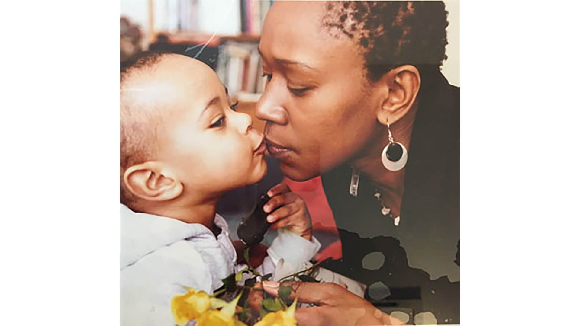 Teo kissing her son, Matthew.